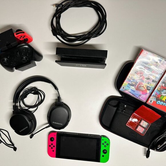 Nintendo Switch 32GB Black Console w/ 2 sets of Joy ConsPro Controller + more